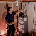 Professional diagnosing the issue of the heat pump